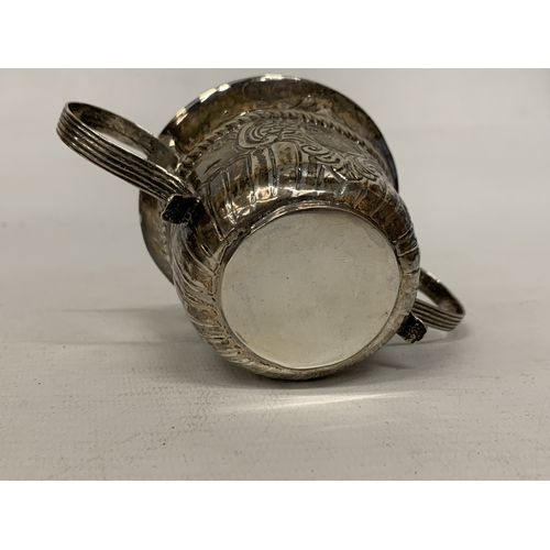 30A - A SILVER TWIN HANDLED CUP WITH REPOUSSE DECORATION - WEIGHT 59.34 G