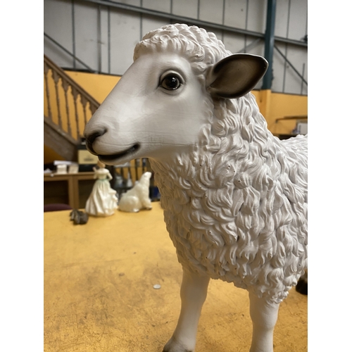65 - A GARDEN SHEEP ORNAMENT, HEIGHT 38CM, LENGTH 45CM