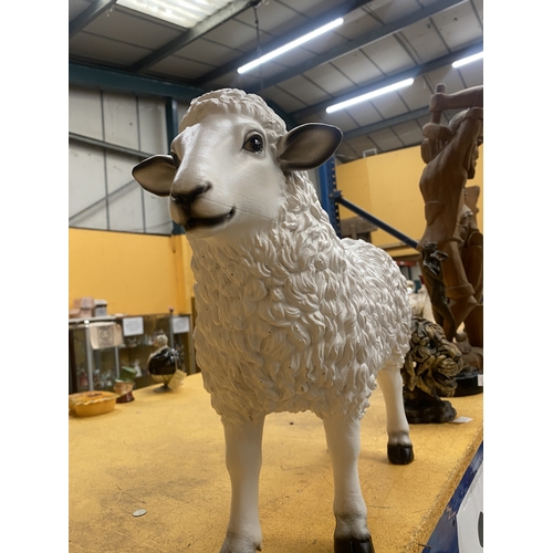 65 - A GARDEN SHEEP ORNAMENT, HEIGHT 38CM, LENGTH 45CM