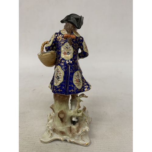82 - A VINTAGE CROWN DERBY FIGURE OF A BOY WITH A BASKET AND A GAME BIRD, HEIGHT 18CM