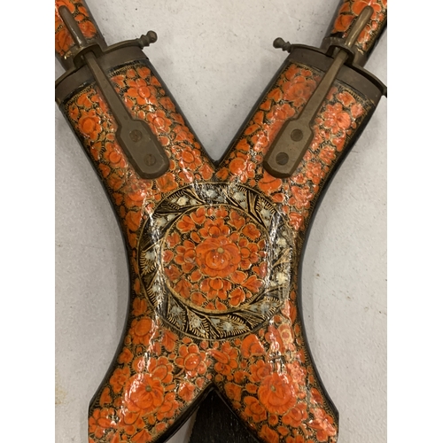 117 - AN ENAMELLED AND MOTHER OF PEARL DECORATED KNIFE SET