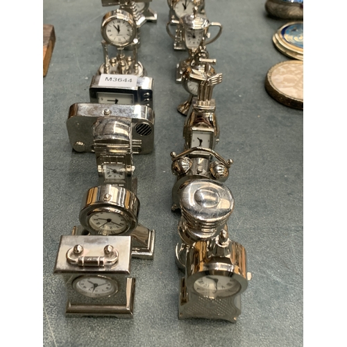 166 - A LARGE COLLECTION OF SILVER COLOURED MINIATURE CLOCKS