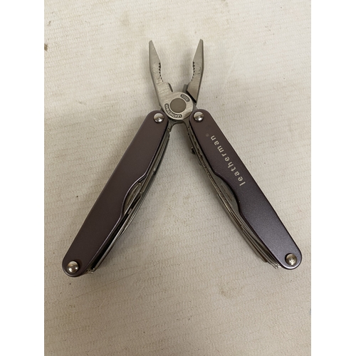 24 - A STAINLESS STEEL LEATHERMAN MULTI-TOOL