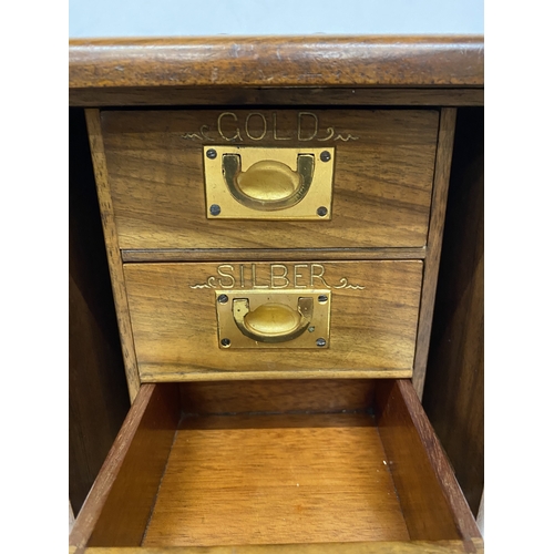 3 - A VINTAGE THREE DOOR CAMPAIGN JEWELLERY CABINET WITH BRASS RECESSED HANDLES, COMPLETE WITH KEY AND D... 