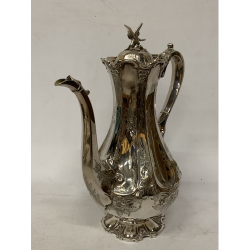 40 - A ROCOCO STYLE SILVER PLATE COFFEEPOT WITH HIGH RELIEF DECORATION WITH AN EAGLE FINIAL