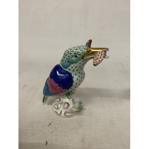 46 - A HEREND PORCELAIN PARTRIDGE FIGURE MODEL NUMBER 5071 WITH THE BRAND'S SIGNATURE BLUE FISHNET PATTER... 