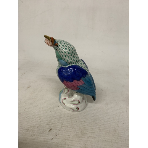 46 - A HEREND PORCELAIN PARTRIDGE FIGURE MODEL NUMBER 5071 WITH THE BRAND'S SIGNATURE BLUE FISHNET PATTER... 