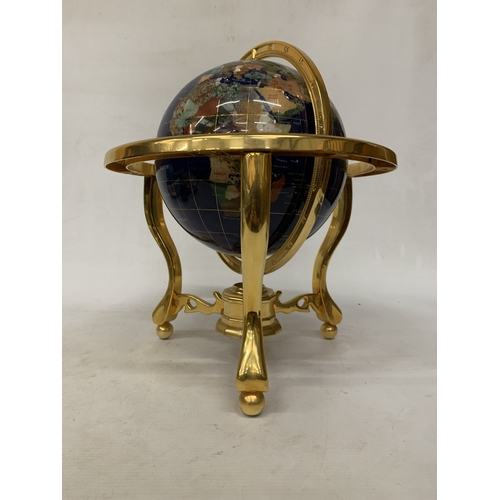 48 - A GEMSTONE WORLD GLOBE FEATURING A LAPIS LAZULI OCEAN WITH INLAID SEMI-PRECIOUS STONE CONTINENTS MOU... 