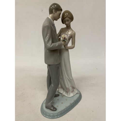 50 - A  BOXED LLADRO PORCELAIN FIGURE GROUP 