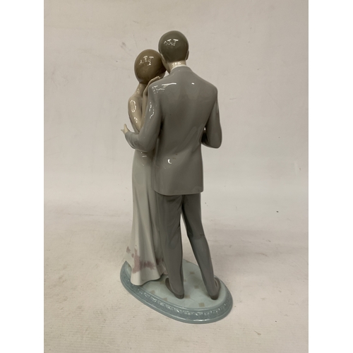 50 - A  BOXED LLADRO PORCELAIN FIGURE GROUP 