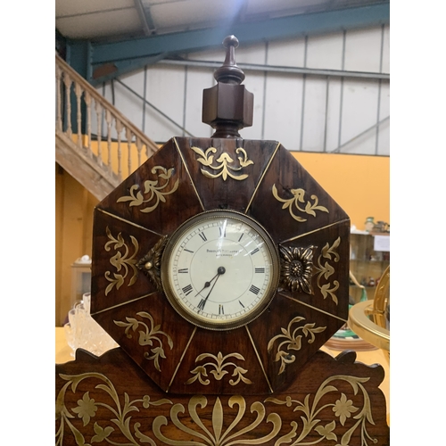 48A - A REGENCY STYLE MANTEL CLOCK WITH INTRICATE BRASS INLAY DEPICTING HORSES AND RIDERS HOUSED IN AN OCT... 
