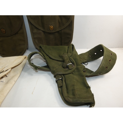 308 - A COLLECTION OF THREE MILITARY CANVAS HOLSTERS AND THREE POUCHES (6)