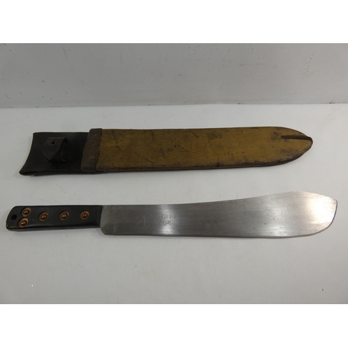 312 - A MILITARY MACHETTE AND SCABBARD, THE 37CM BLADE DATED 1964