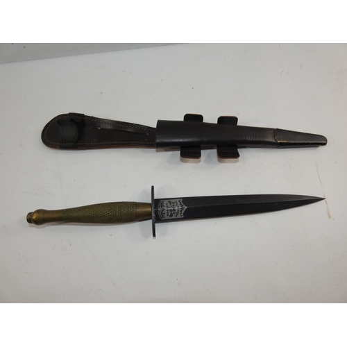 313 - A FAIRBAIRN SYKES FIGHTING KNIFE AND SCABBARD, 17CM BLADE, LENGTH 33CM