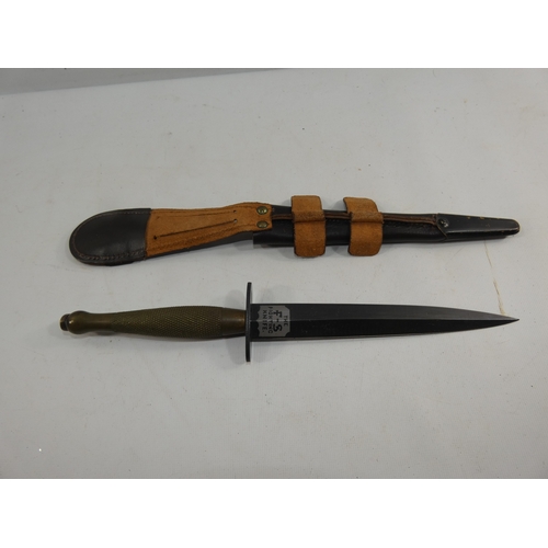 313 - A FAIRBAIRN SYKES FIGHTING KNIFE AND SCABBARD, 17CM BLADE, LENGTH 33CM