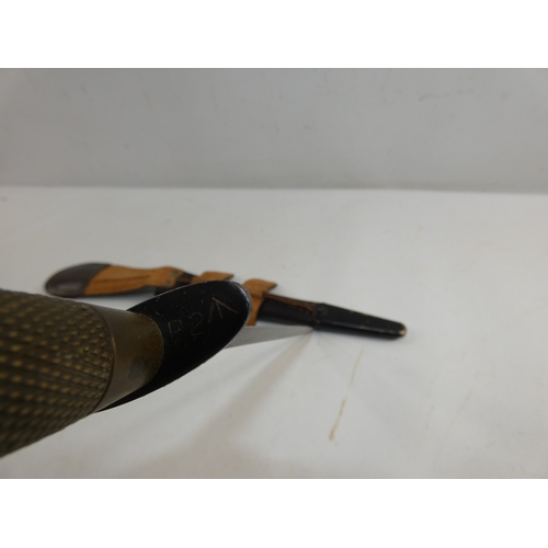 313 - A FAIRBAIRN SYKES FIGHTING KNIFE AND SCABBARD, 17CM BLADE, LENGTH 33CM