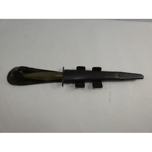 313 - A FAIRBAIRN SYKES FIGHTING KNIFE AND SCABBARD, 17CM BLADE, LENGTH 33CM
