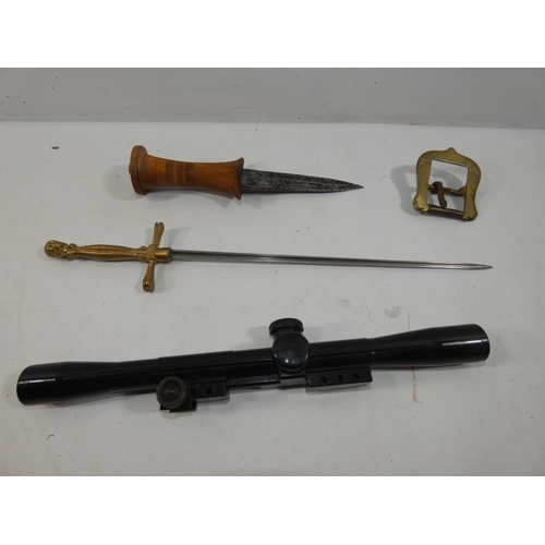 317 - A VINTAGE DAGGER 11CM BLADE, BELT BUCKLE TELESCOPIC SIGHT AND A DAGGER WITH BRASS GRIP
