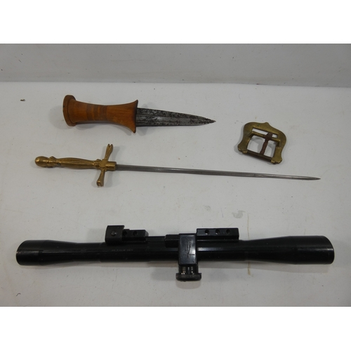 317 - A VINTAGE DAGGER 11CM BLADE, BELT BUCKLE TELESCOPIC SIGHT AND A DAGGER WITH BRASS GRIP