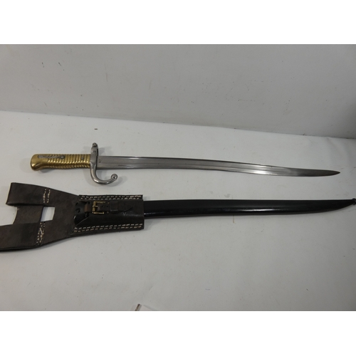 324 - A FRENCH CHASSEPOT BAYONET AND SCABBARD 58CM BLADE LENGTH 71CM