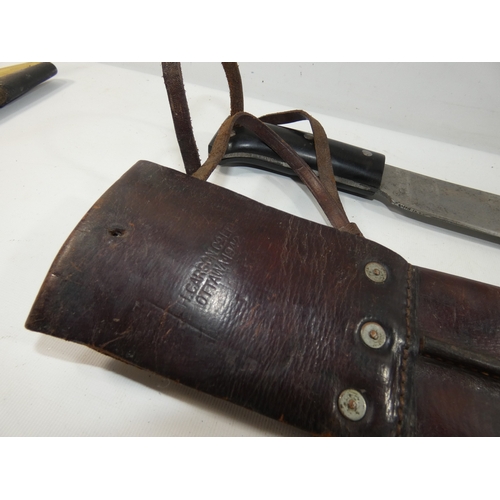 325 - A WORLD WAR II MACHETTE AND SCABBARD, 38CM BLADE DATED 1944, LENGTH 54CM