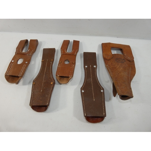 333 - A COLLECTION OF FIVE LEATHER BAYONET FROGS