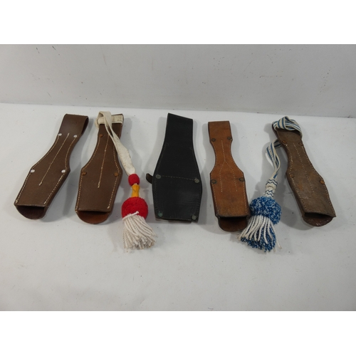 334 - A COLLECTION OF FIVE LEATHER BAYONET FROGS