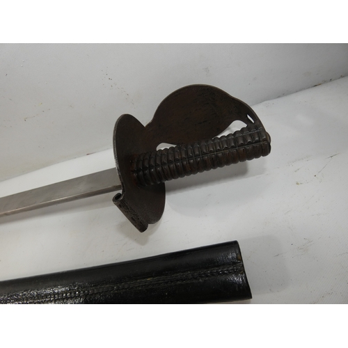 341 - A NAVAL BOARDING CUTLASS AND SCABBARD, 76CM BLADE, STEEL SHELL GUARD, LENGTH 89CM