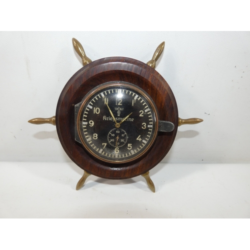 343 - A NAZI GERMANY WORLD WAR II KRIEGSMARINE CLOCK BY JUNGHAMS, BLACK DIAL WITH WHITE NUMERALS, MARKED W... 