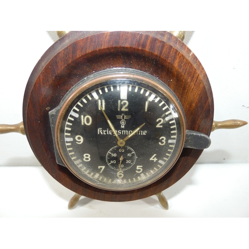 343 - A NAZI GERMANY WORLD WAR II KRIEGSMARINE CLOCK BY JUNGHAMS, BLACK DIAL WITH WHITE NUMERALS, MARKED W... 