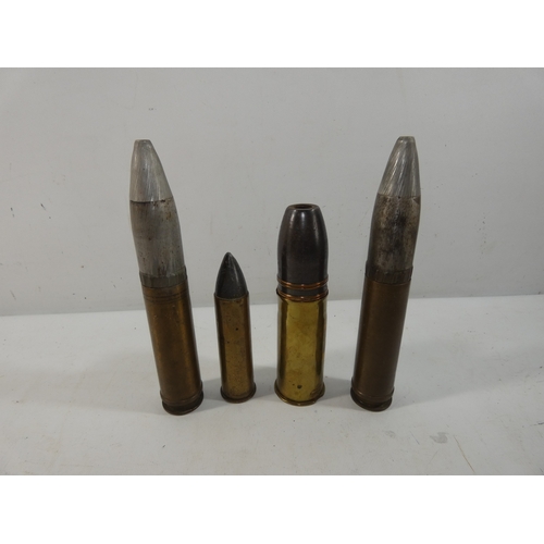 352 - A COLLECTION OF FOUR INERT SHELLS, HEIGHTS FROM 13 TO 20CM