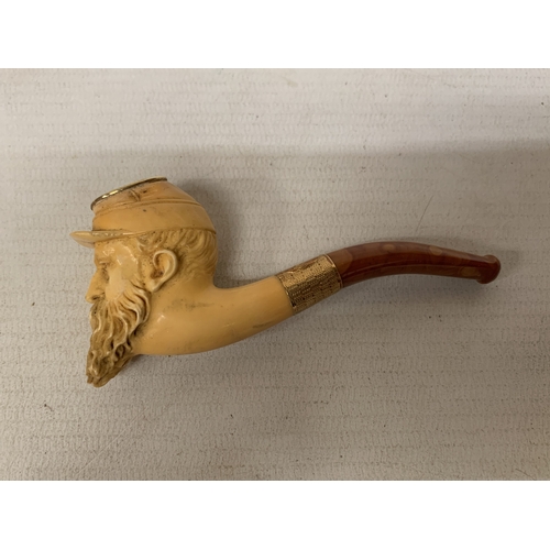 2 - AN ANTIQUE CASED MEERSCHAUM PIPE, CARVED AS A MAN'S HEAD WEARING A FRENCH MILITARY CAP, WITH 14CT GO... 