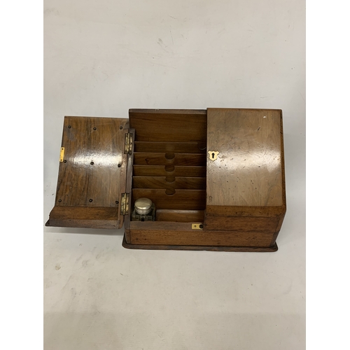 8 - A CIRCA 1920 BURR WALNUT DESK TIDY CABINET WITH INKWELLS