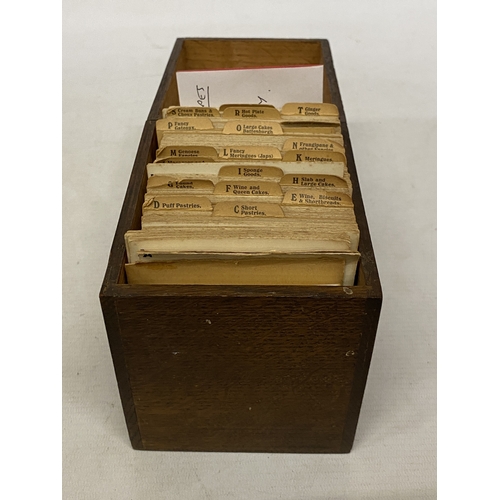 11 - A CIRCA 1920'S SET OF COMMERCIAL BAKERY RECIPE CARDS IN AN OAK CASE