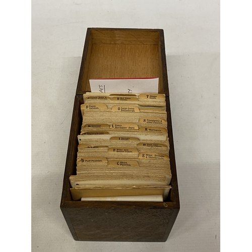11 - A CIRCA 1920'S SET OF COMMERCIAL BAKERY RECIPE CARDS IN AN OAK CASE