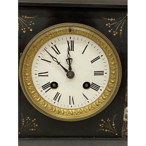 25 - A VINTAGE HEAVY SLATE CHIMING MANTLE CLOCK WITH BRASS HANDLES AND KEY