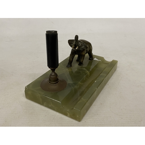 26 - AN ART DECO DESK TOP FOUNTAIN PEN HOLDER WITH A CAST METAL ELEPHANT FIGURE ON A GREEN ONYX BASE