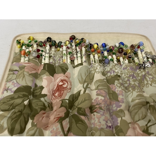 32 - A COLLECTION OF APPROX 54 BONE LACE MAKING BOBBINS WITH DECORATION, CHARMS AND SPANGLES