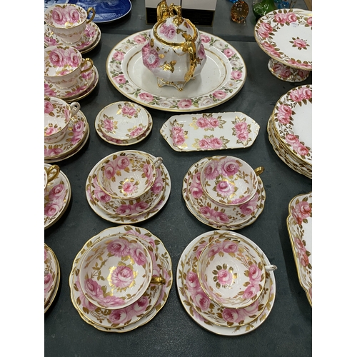 54 - AN ANTIQUE 'SWANSEA ROSE' BY GROSVENOR, CHINA TEASET TO INCLUDE A CAKE STAND, TRIOS, LIDDED CABBAGE ... 