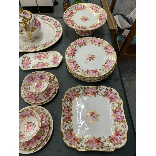 54 - AN ANTIQUE 'SWANSEA ROSE' BY GROSVENOR, CHINA TEASET TO INCLUDE A CAKE STAND, TRIOS, LIDDED CABBAGE ... 
