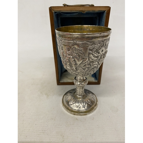 1 - A TESTED TO 800 SILVER CHINESE EXPORT GOBLET WITH REPOUSSE DECORATION OF FIGURES IN A LANDSCAPE WITH... 