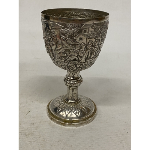 1 - A TESTED TO 800 SILVER CHINESE EXPORT GOBLET WITH REPOUSSE DECORATION OF FIGURES IN A LANDSCAPE WITH... 
