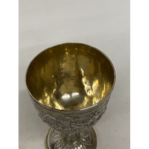1 - A TESTED TO 800 SILVER CHINESE EXPORT GOBLET WITH REPOUSSE DECORATION OF FIGURES IN A LANDSCAPE WITH... 
