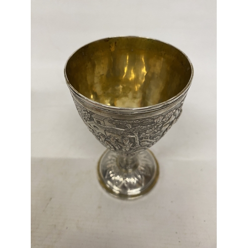 1 - A TESTED TO 800 SILVER CHINESE EXPORT GOBLET WITH REPOUSSE DECORATION OF FIGURES IN A LANDSCAPE WITH... 