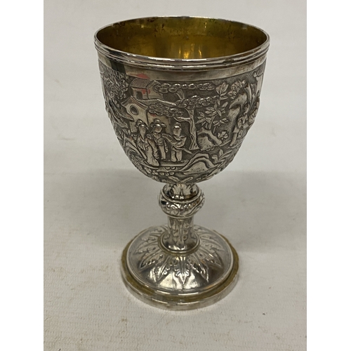 1 - A TESTED TO 800 SILVER CHINESE EXPORT GOBLET WITH REPOUSSE DECORATION OF FIGURES IN A LANDSCAPE WITH... 