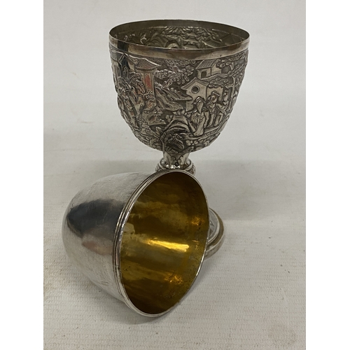 1 - A TESTED TO 800 SILVER CHINESE EXPORT GOBLET WITH REPOUSSE DECORATION OF FIGURES IN A LANDSCAPE WITH... 