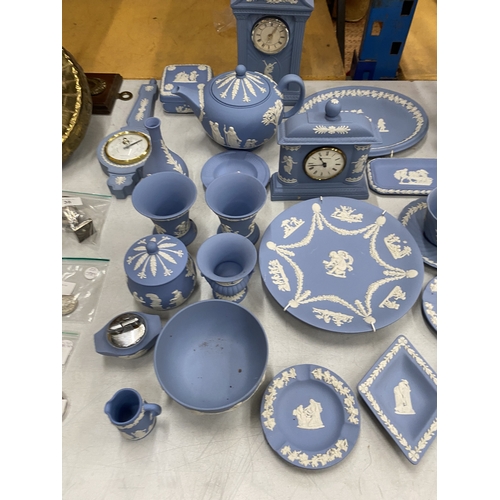 36 - A LARGE QUANTITY OF WEDGWOOD JASPER WARE TO INCLUDE, TEAPOTS, CLOCKS, A CUP AND SAUCER, PIN TRAYS, P... 