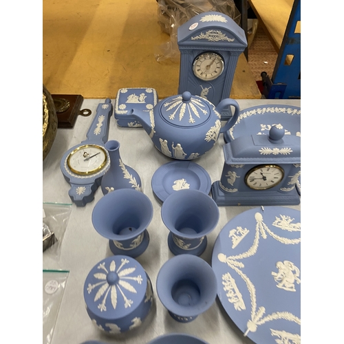 36 - A LARGE QUANTITY OF WEDGWOOD JASPER WARE TO INCLUDE, TEAPOTS, CLOCKS, A CUP AND SAUCER, PIN TRAYS, P... 