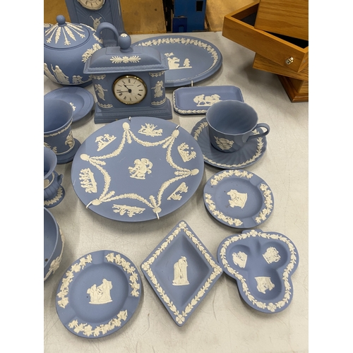 36 - A LARGE QUANTITY OF WEDGWOOD JASPER WARE TO INCLUDE, TEAPOTS, CLOCKS, A CUP AND SAUCER, PIN TRAYS, P... 
