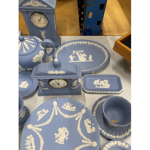 36 - A LARGE QUANTITY OF WEDGWOOD JASPER WARE TO INCLUDE, TEAPOTS, CLOCKS, A CUP AND SAUCER, PIN TRAYS, P... 